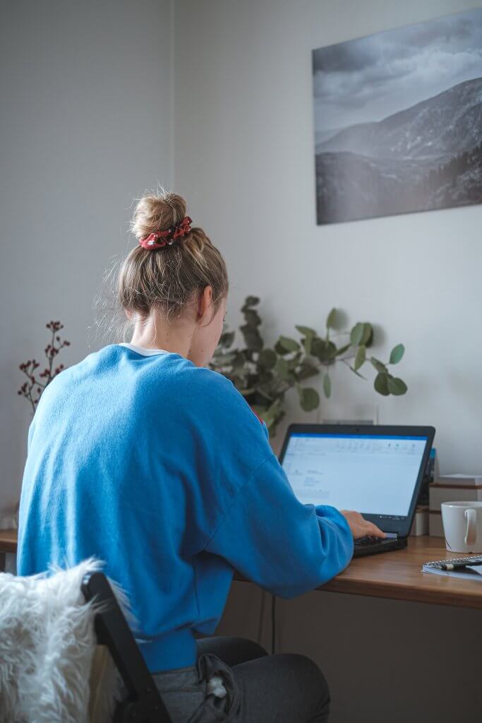 a woman studying from home during quarantine
